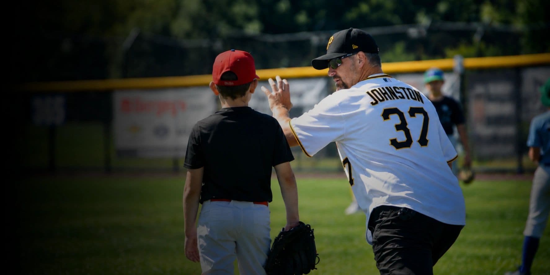 Mike Johnston coaching on the field